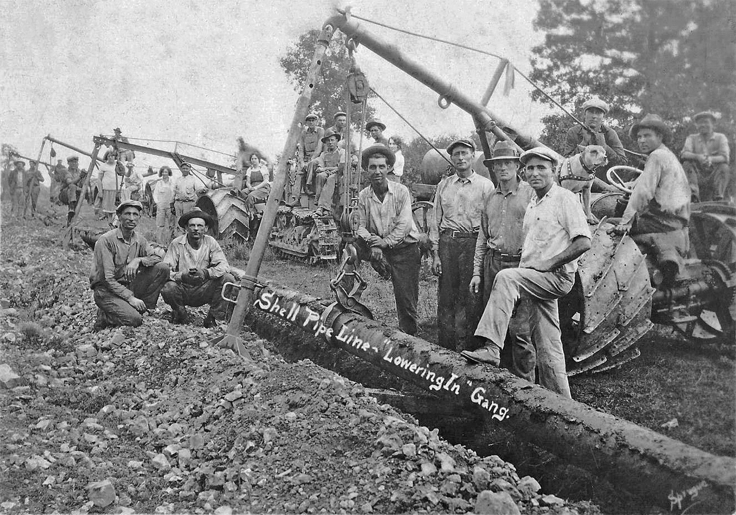 GREAT GRANDFATHER INSTALLING SHELL PIPELINE